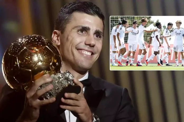 Rodri sosteniendo el Balón de Oro