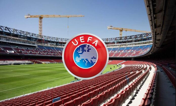 El logo de la UEFA y una foto del Camp Nou en medio de las obras. 