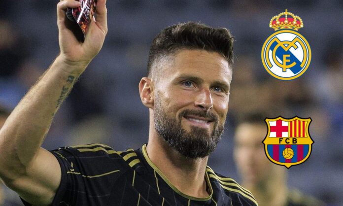 Giroud y los escudos del Real Madrid y el Barcelona. 