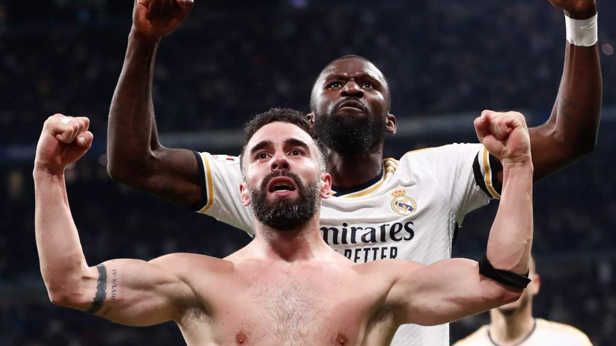 Dani Carvajal y Antonio Rudiger celebrando una victoria con el Real Madrid. 